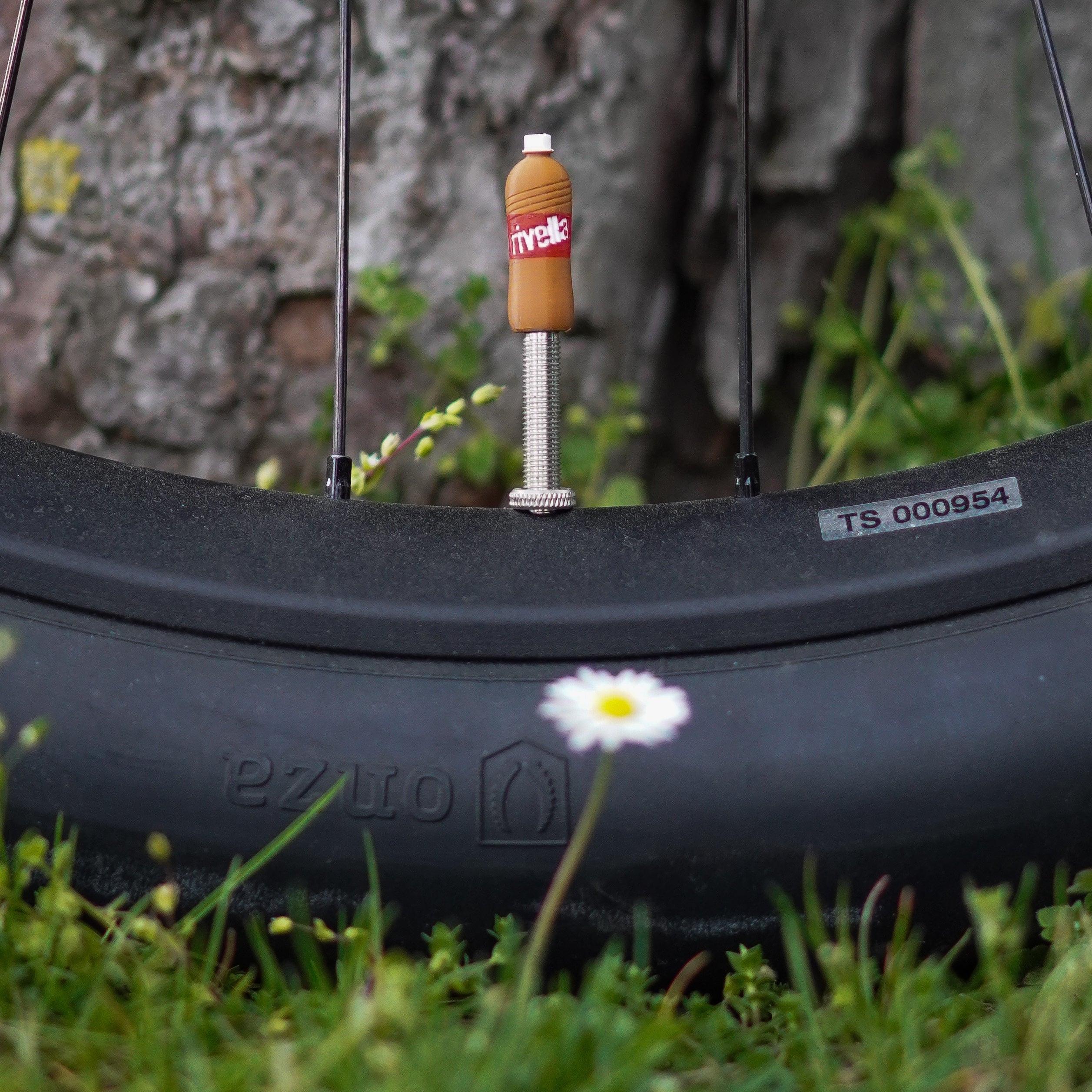Rivella | Ventilkappe.