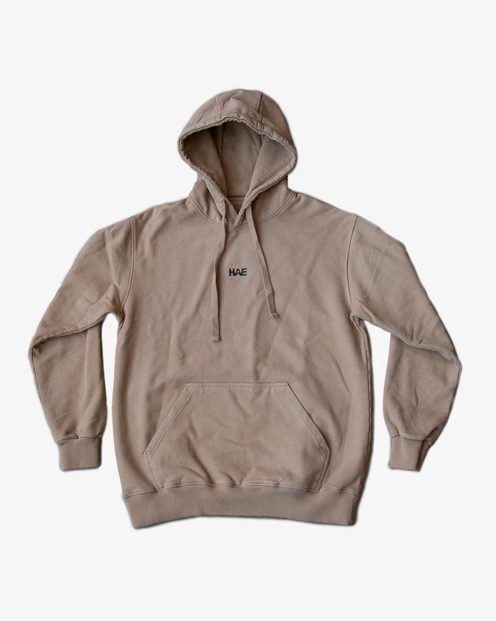 HAE Essentials Hoodie "Raised by the Alps".